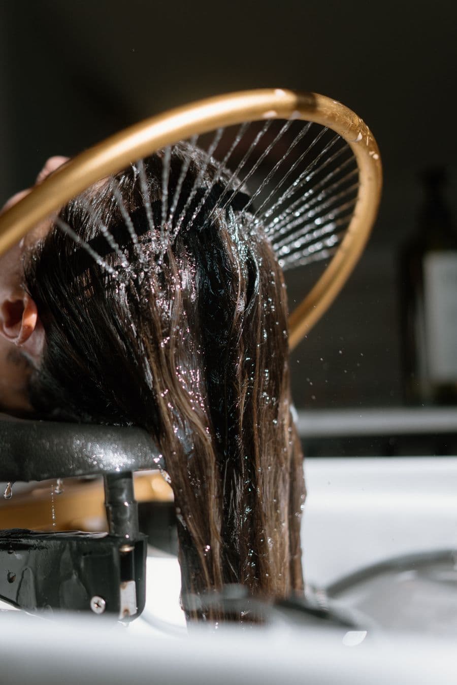 Scalp rinse at the Wellspring shampoo bowl